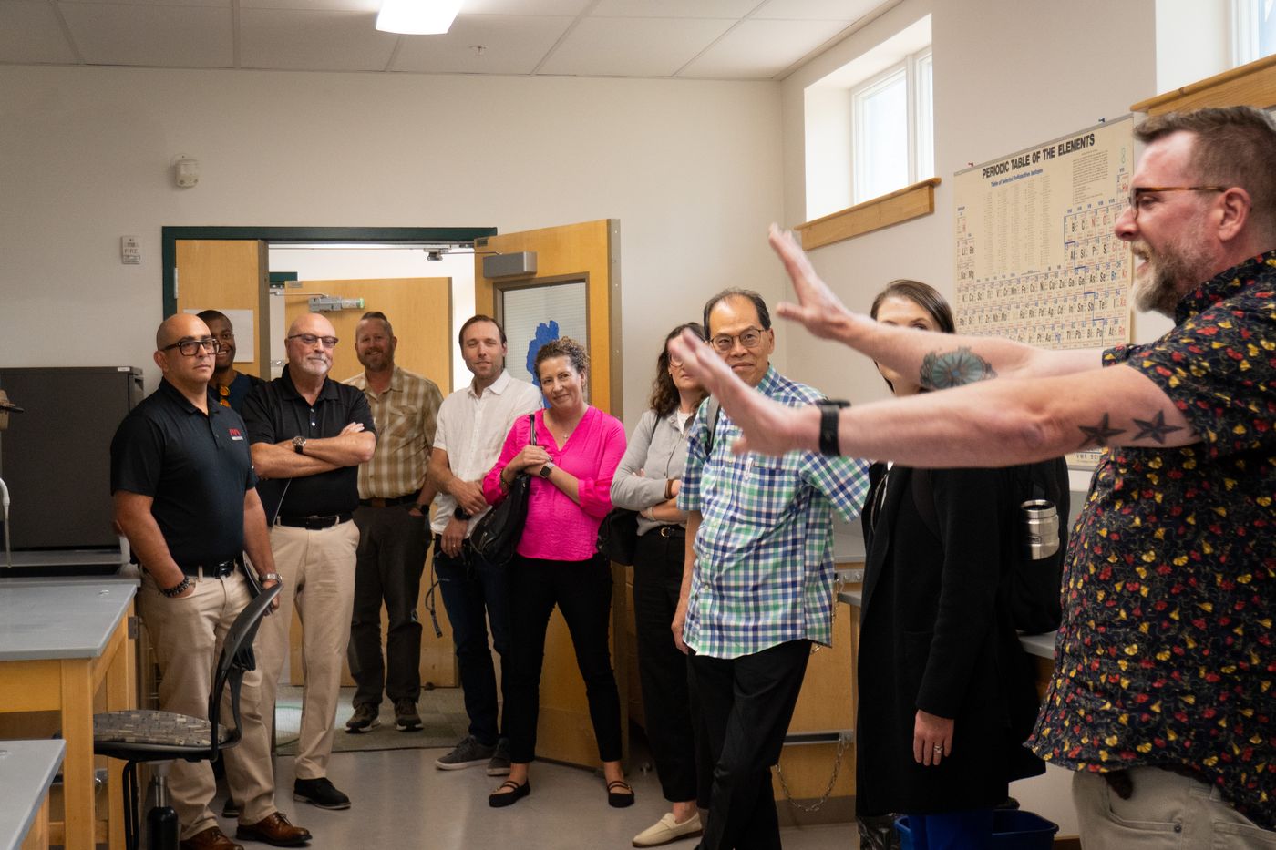 Open house guests touring the new lab
